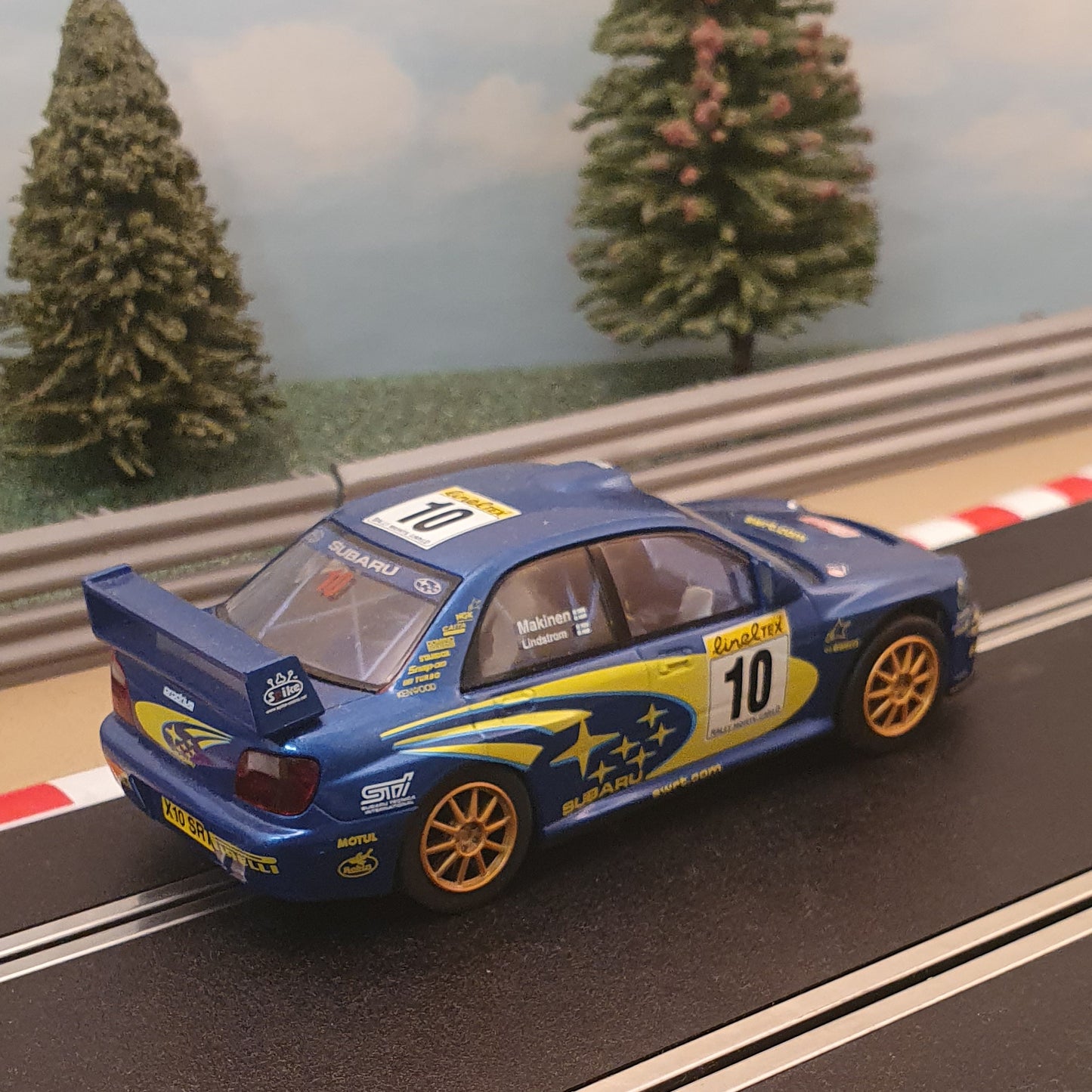 Scalextric 1:32 Car - C2412 Subaru Impreza WRC Makinen #10 *LIGHTS* #Q