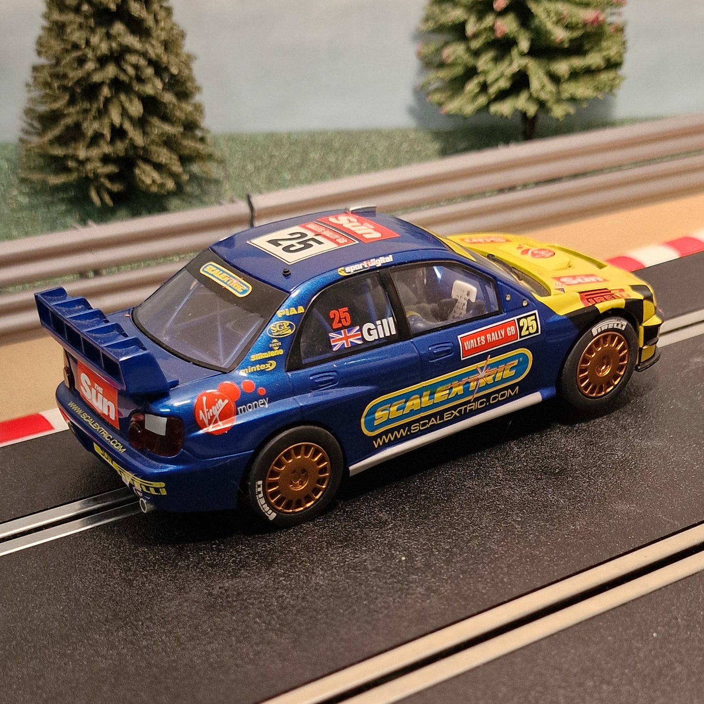 Scalextric 1:32 Car - C2666 Subaru Impreza WRC The Sun #25 *LIGHTS*