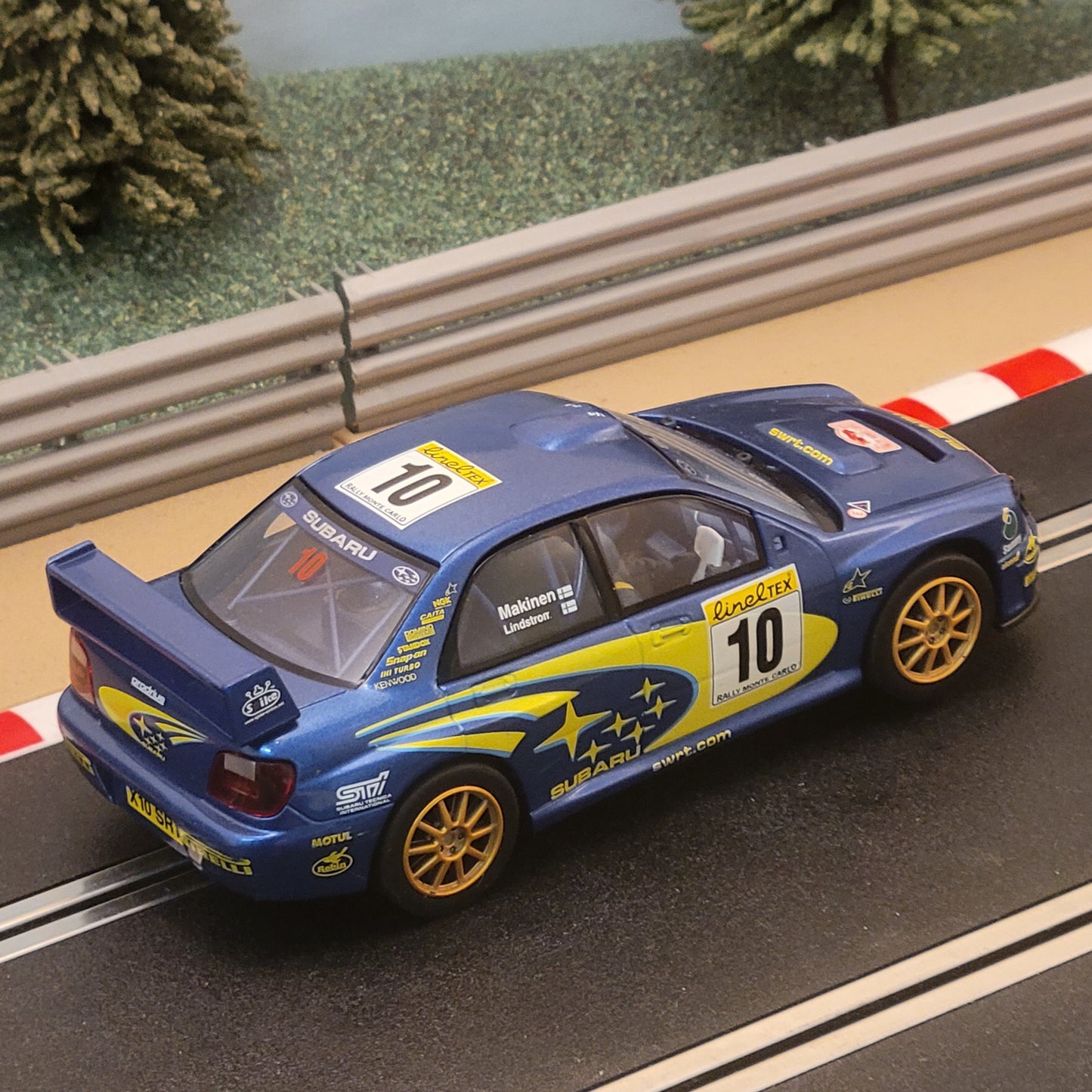 Coche Scalextric 1:32 - C2412 Subaru Impreza WRC Makinen #10 *LUCES* #W