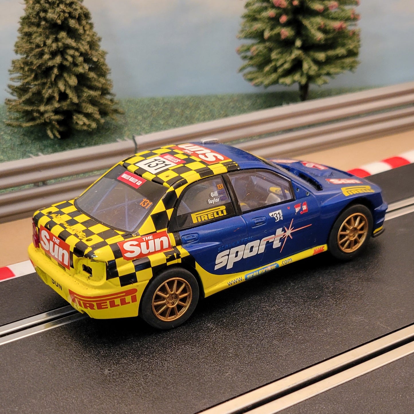 Coche Scalextric 1:32 - C2550 Subaru WRC The Sun #131 *LUCES* #FMS
