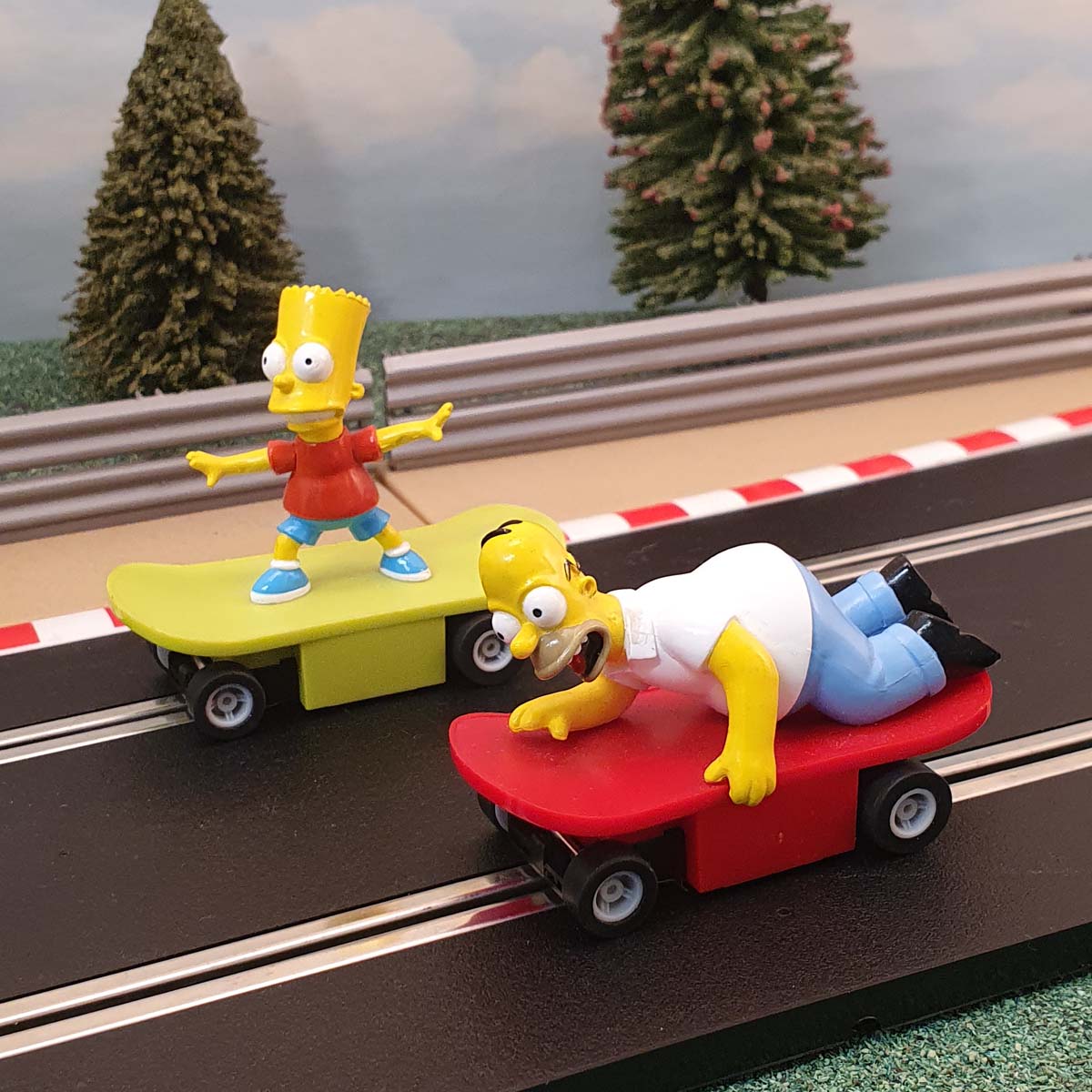 Micro Scalextric 1:64 Cars - Bart & Homer Simpsons On Skateboards