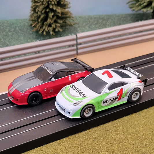 Micro Scalextric Pair 1:64 Cars - Nissan 350Z Need For Speed & #1