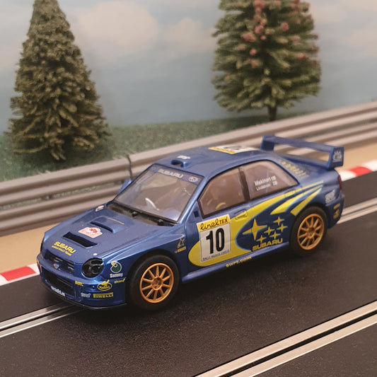 Scalextric 1:32 Car - C2412 Subaru Impreza WRC Makinen #10 *LIGHTS* #Q