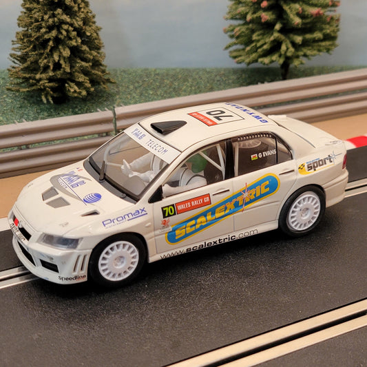 Scalextric 1:32 Car - C2682 White Mitsubishi Lancer WRC #70 Evans *LIGHTS* #WMS
