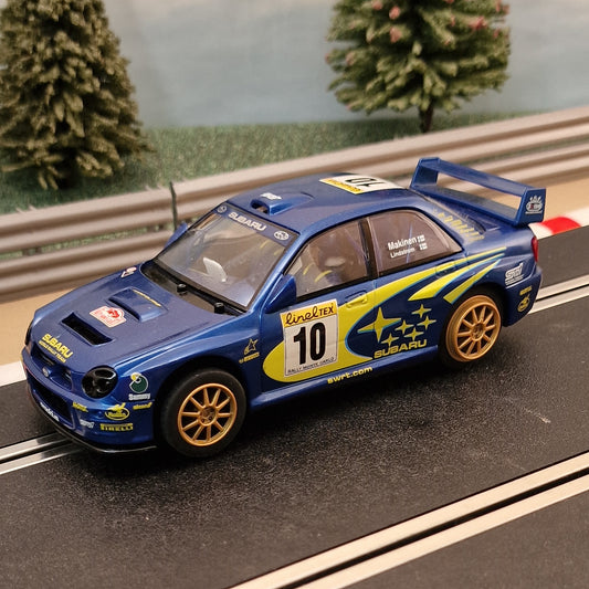 Scalextric 1:32 Car - C2412 Subaru Impreza WRC Makinen #10 *LIGHTS* #J