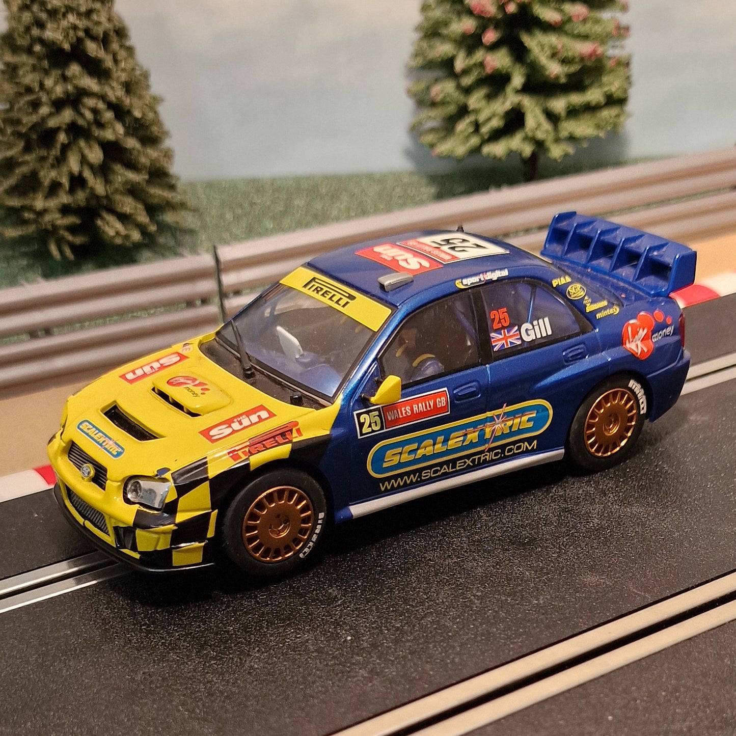 Scalextric 1:32 Car - C2666 Subaru Impreza WRC The Sun #25 *LIGHTS*