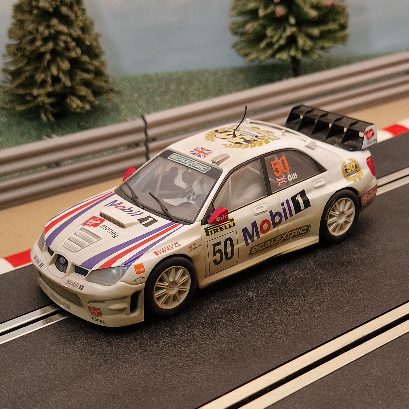 Scalextric C2789 Subaru Impreza WRC The Sun #50 4WD Gill *LIGHTS*