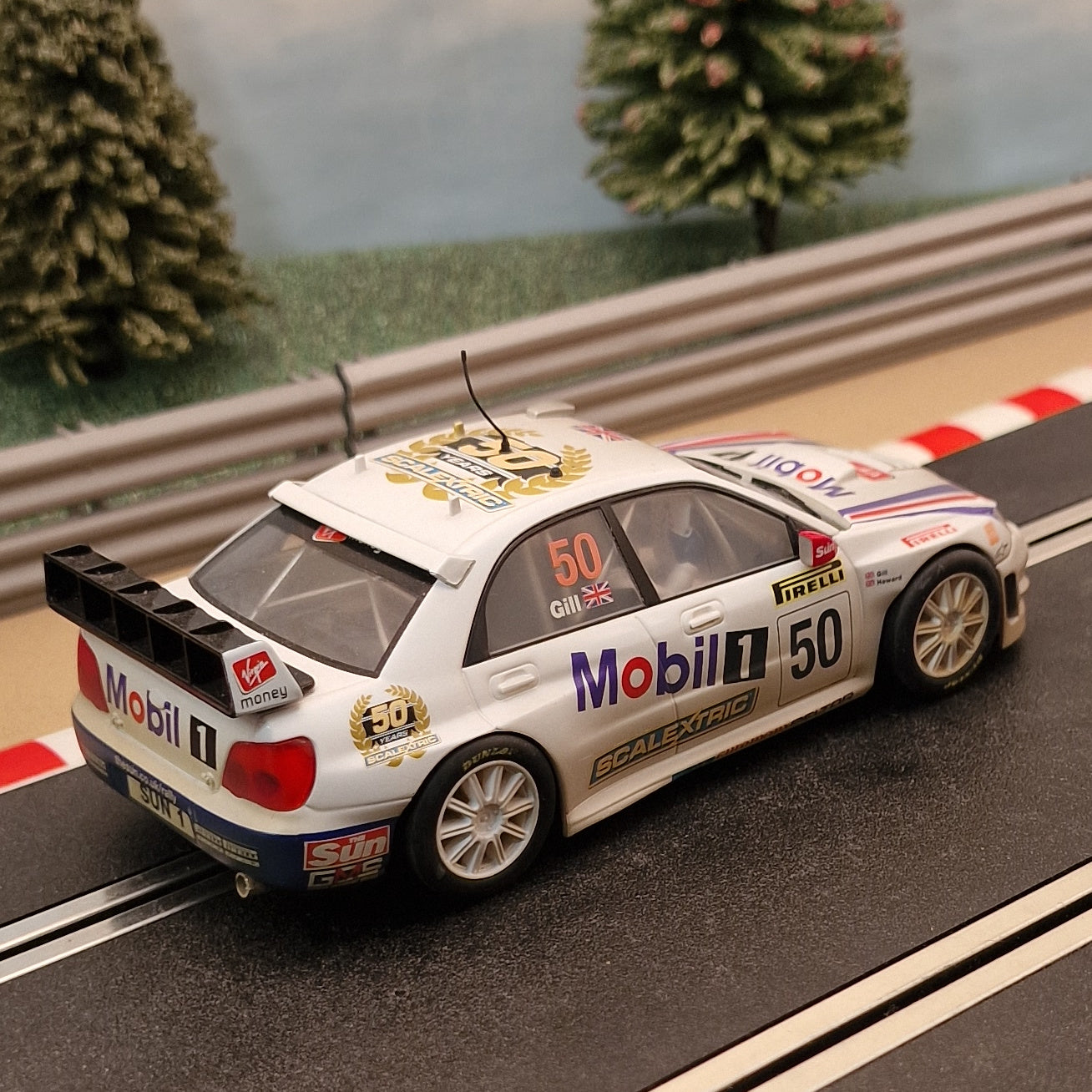 Scalextric C2789 Subaru Impreza WRC The Sun #50 4WD Gill *LIGHTS*