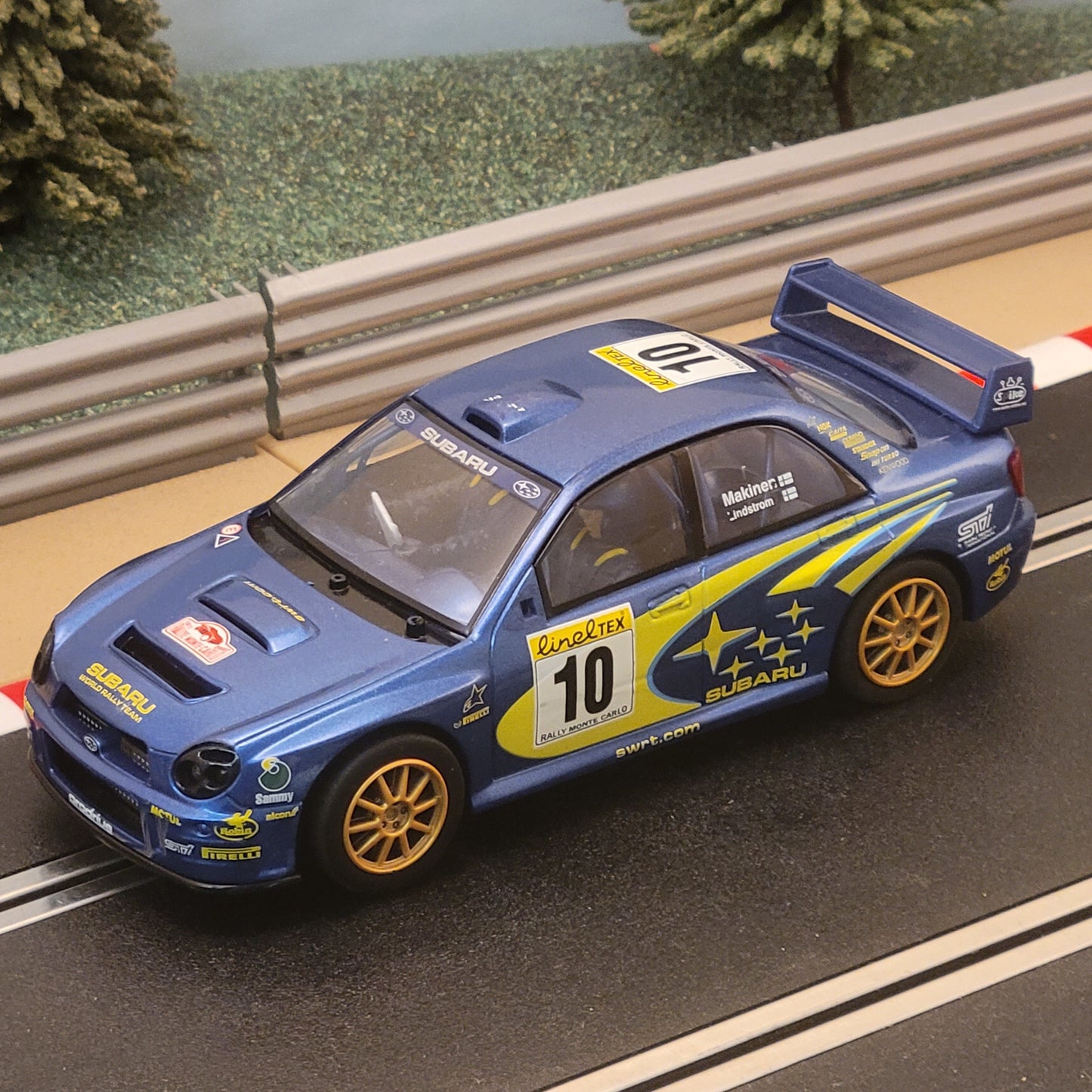Coche Scalextric 1:32 - C2412 Subaru Impreza WRC Makinen #10 *LUCES* #W