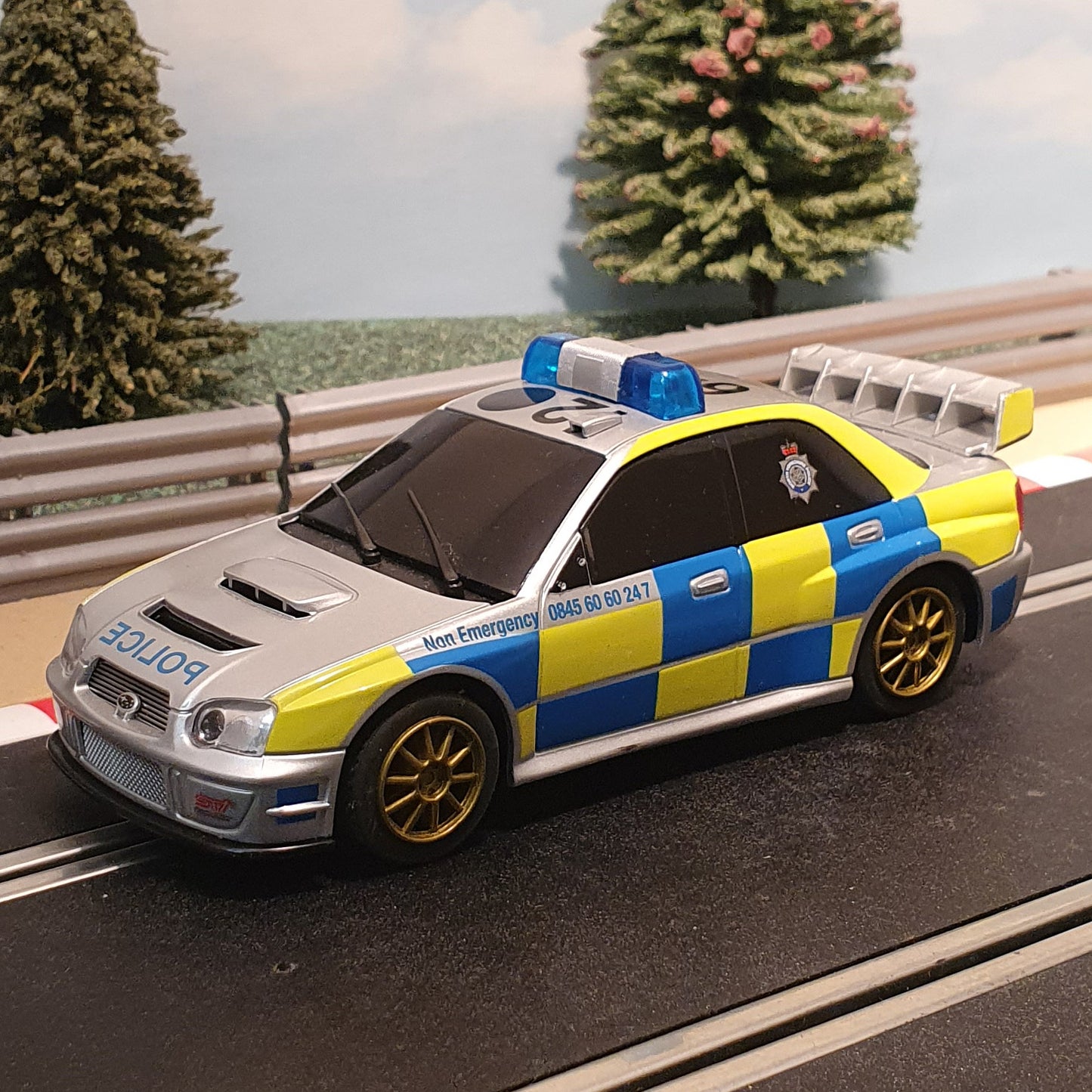 Scalextric C3068D Subaru Impreza Police Car