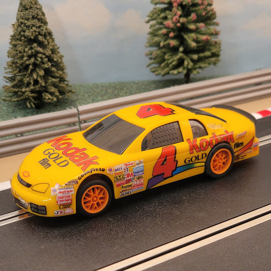 Coche Scalextric 1:32 - Ford Taurus Kodak Oro nº4