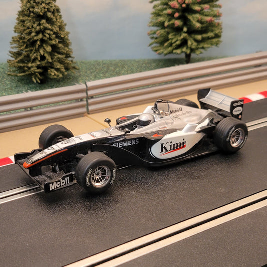 Coche Scalextric 1:32 - C2668 F1 Mercedes Benz McLaren MP4-16 Kimi #9 IV