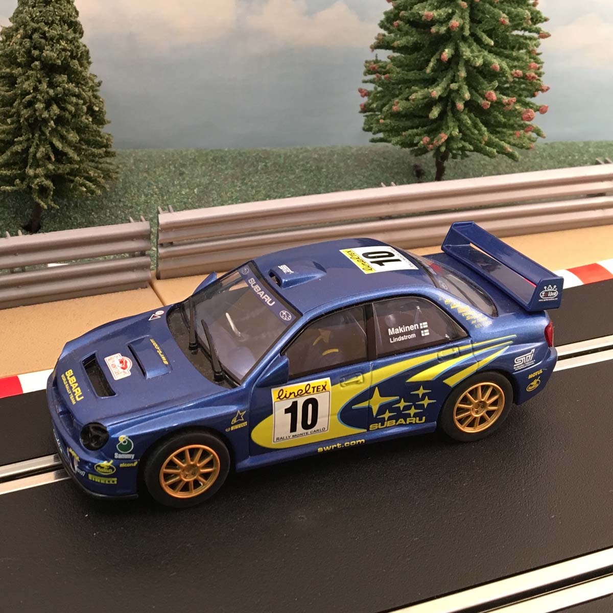 Scalextric 1:32 Car - C2412 Subaru Impreza WRC Makinen #10 *LIGHTS* #E