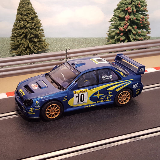 Scalextric 1:32 Car - C2412 Subaru Impreza WRC Makinen #10 *LIGHTS* #WG