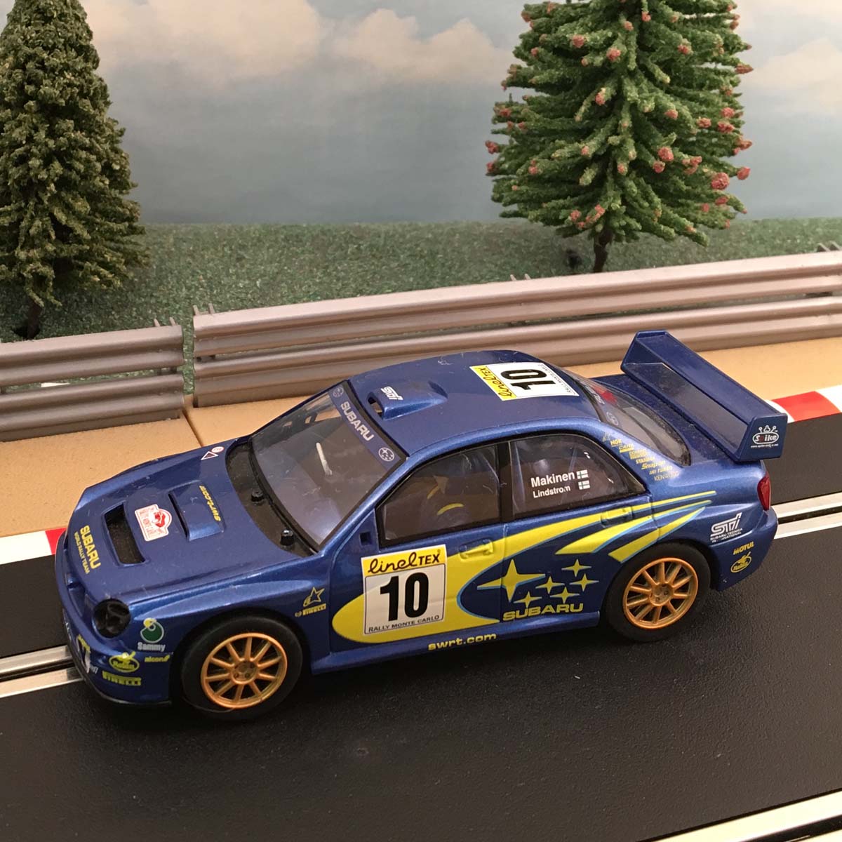 Scalextric C2412 Subaru Impreza WRC Makinen #10 *LIGHTS* #MWG